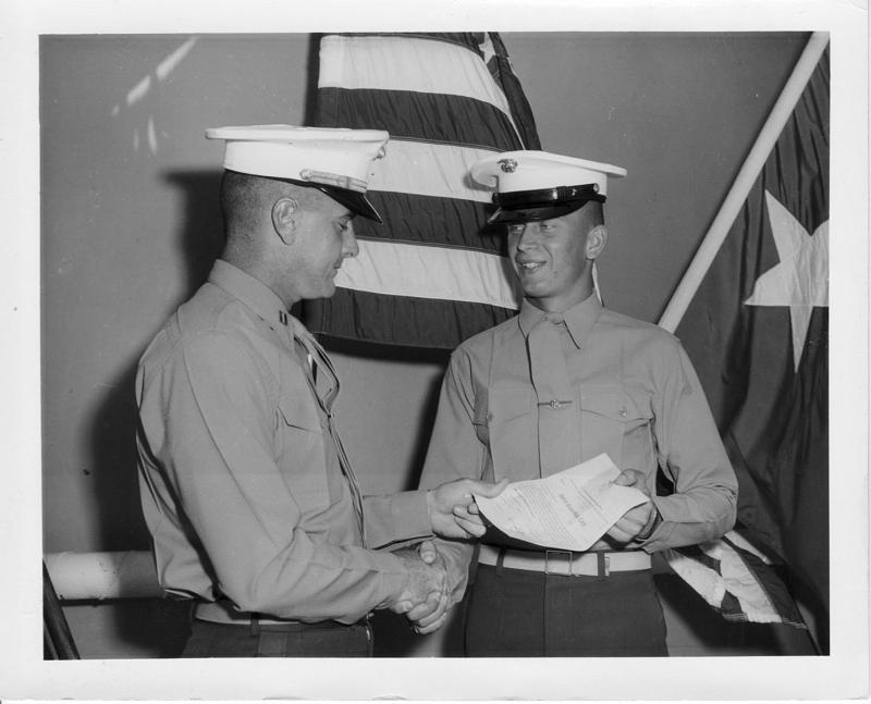 20.jpg - Captain Yezzi presents Ted Mischnick with his promotion papers to PFC (E-2)